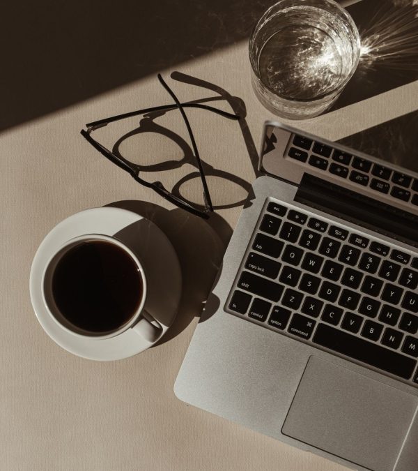computer-glasses-and-coffee-on-desk-bespoke-social-co-social-media-management-and-strategy-services